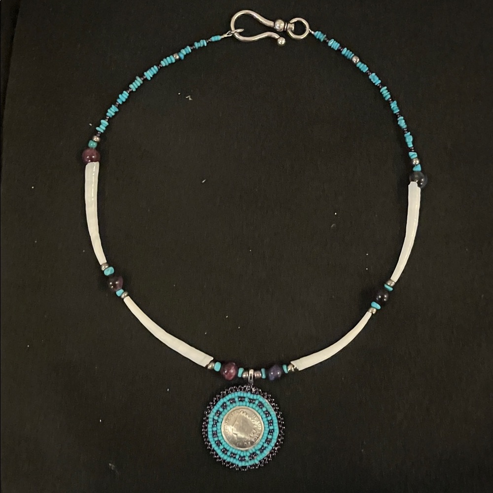 Elegant Beaded Necklace with Silver Pendant